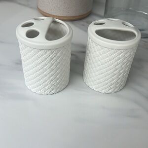 Pair of Pottery Barn ceramic toothbrush holders